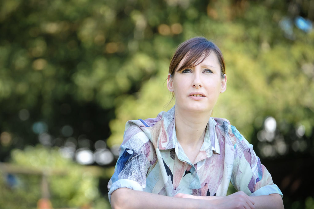 Corporate marketing photography with image from a series showing a female student with a thoughtful expression and used in marketing material by the charity Action on Addiction