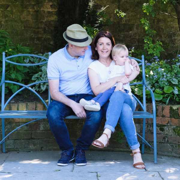Family photography - enjoying a peaceful moment in country house gardens