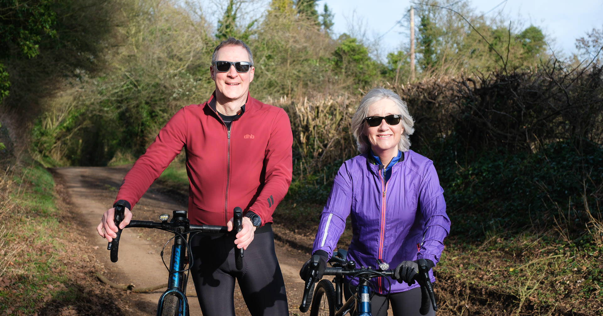 Hero photo of Nick and Gaynor Cole on a winter training bike ride in Wiltshire