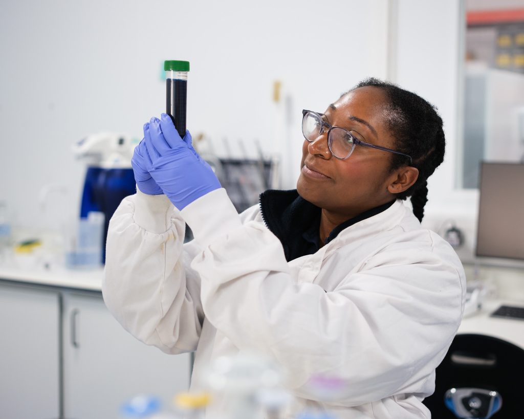 Female R&D chemist checking results in the laboratory