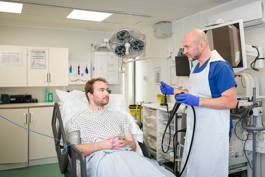 Healthcare professional speaking with a patient in a private hospital ward in Banbury