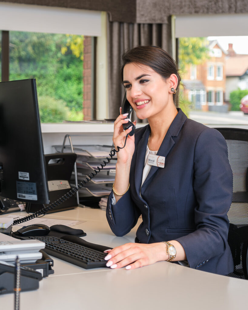 Reception team member welcoming patients at The New Foscote Hospital, Banbury