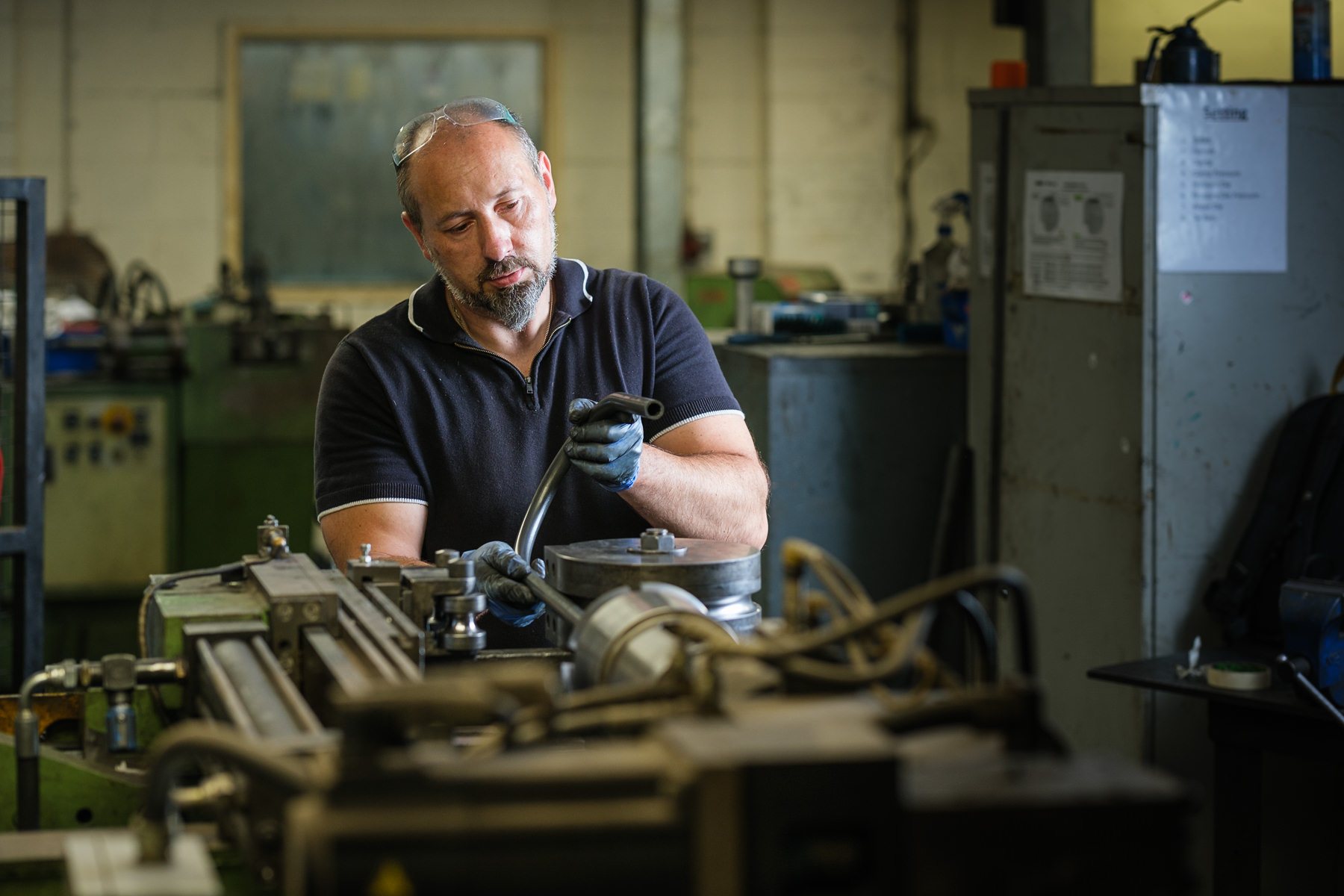 Engineer operating tube bending equipment