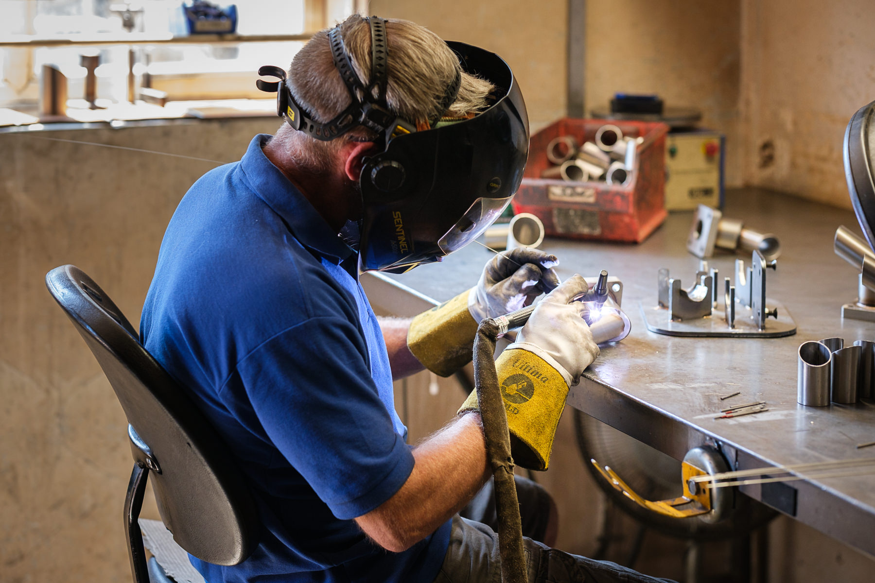 Welding process in manufacturing workshop