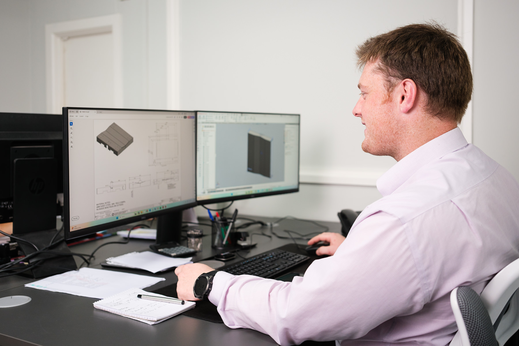 Design engineer working with CAD software